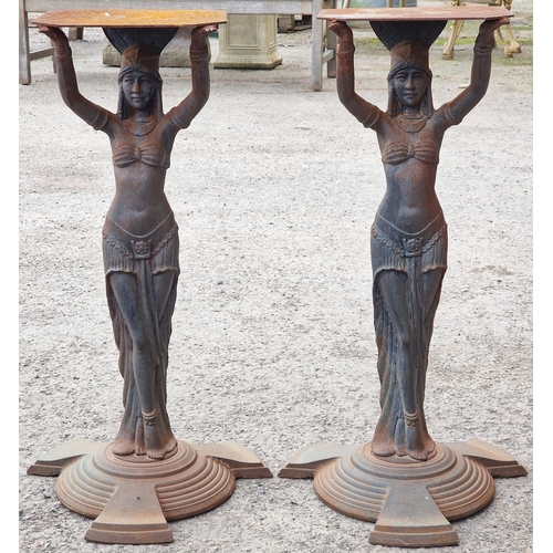 1096 - A pair of Art Deco Egyptian Revival cast iron table bases, 71cm high (2)