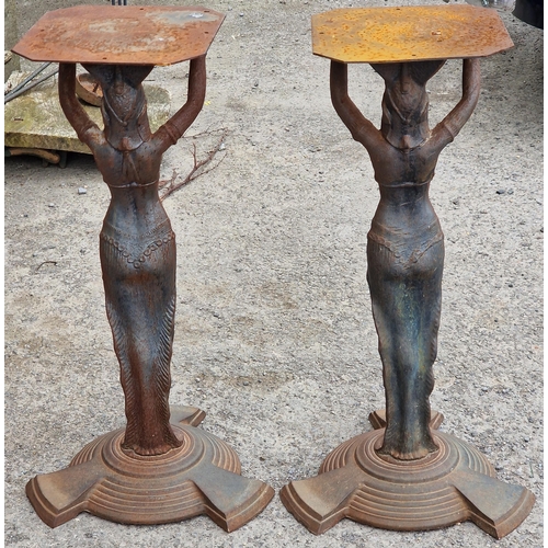 1096 - A pair of Art Deco Egyptian Revival cast iron table bases, 71cm high (2)