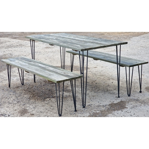 1102 - Contemporary garden table with planked top and tubular legs, 75cm high x 148cm wide x 74cm deep toge... 