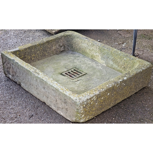 1107 - Weathered natural stone sink/trough with inset iron grate, 16cm high x 68cm wide x 54cm deep