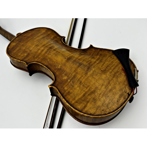 729 - 19th century violin, the label inside for 'Nicolaus Amati', 60cm long, with two bows (3)