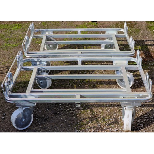 1104 - Pair of tubular steel dolly's/skates with swivel wheels, 20cm high x 82cm wide x 60cm deep (2)