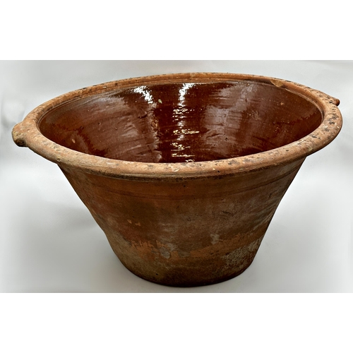 414 - Large 19th century terracotta dairy bowl with glazed interior, 30cm high x 61cm diameter