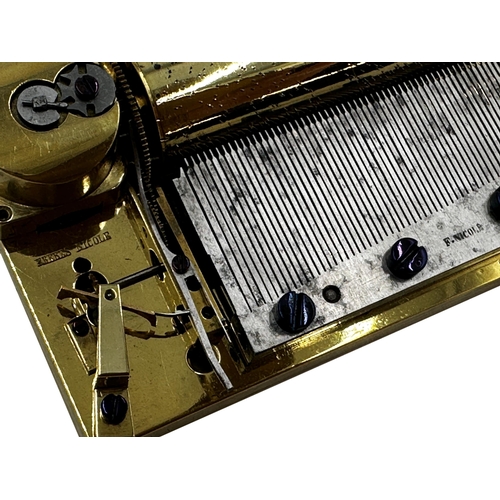 64 - Good early polished brass compact Freres Nicole music box movement, stamped to the comb 10cm long, w... 