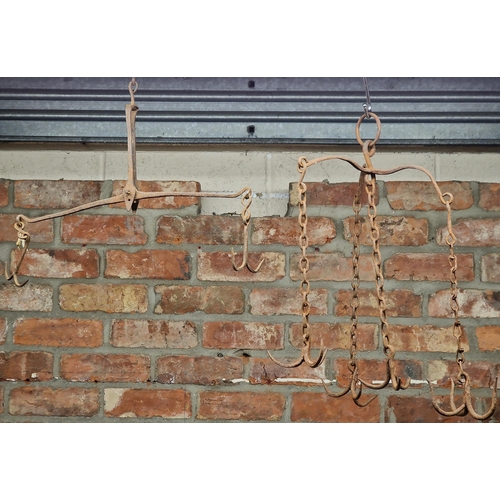 1112 - Antique wrought iron game crown with four triple tipped hooks, 50cm high together with a further twi... 