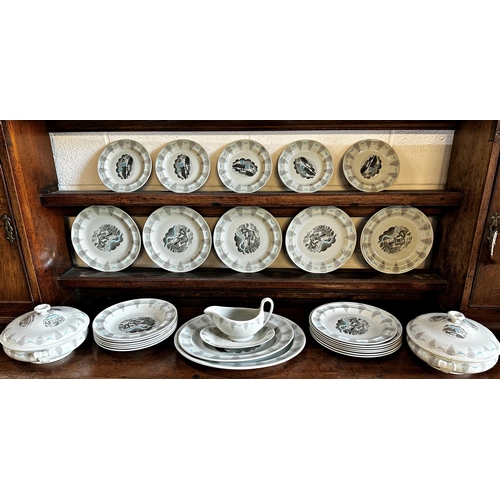 498 - A Wedgwood 'Travel' series dinner service by Eric Ravilious.  Each piece printed with a different mo... 