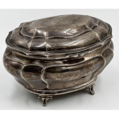 314 - Asprey of London large bombe shaped silver caddy or casket, the hinged lid engraved with a heraldic ... 