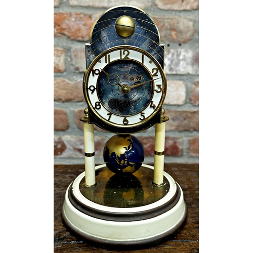 94 - Kaiser Torsion world globe clock with astronomical dial and globe pendulum