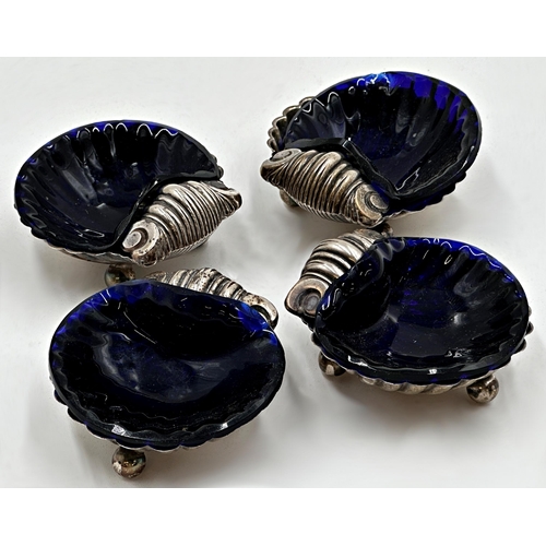 214 - Set of four provincial silver scallop shell salts with blue glass liners, maker Florence Warden, Che... 