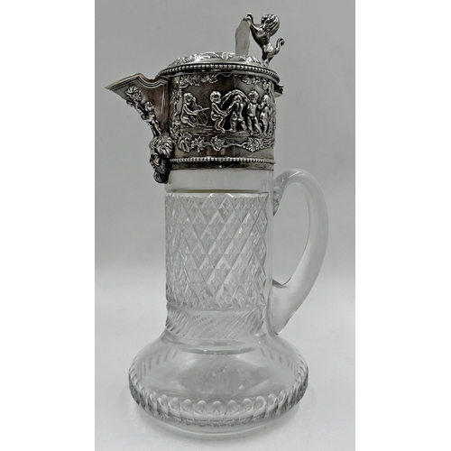 302 - Good quality antique continental 925 silver and cut glass claret jug, the silver top with lion and s... 