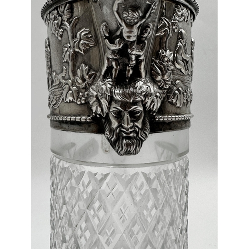 302 - Good quality antique continental 925 silver and cut glass claret jug, the silver top with lion and s... 