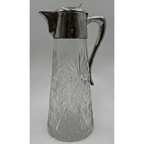 303 - Stylish continental silver and cut glass claret jug, 31cm high