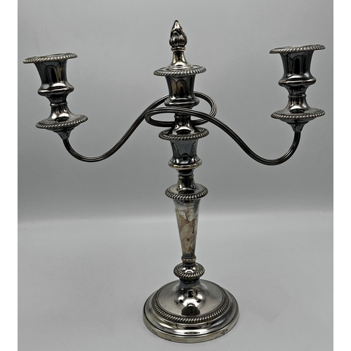 345 - Pair of Harrods Georgian style silver plated twin branch candelabras, 38cm high