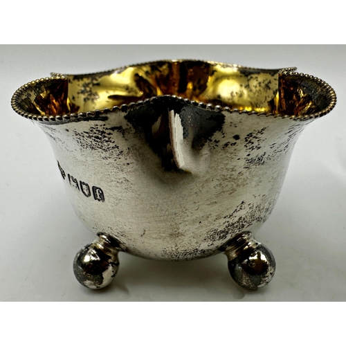 295 - Pair of late Victorian silver lobed salts with gilt interior and ball feet, maker William Hutton and... 