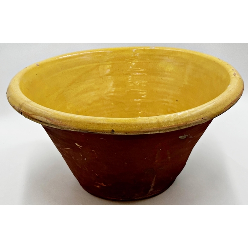 413 - Good terracotta dairy bowl with yellow glazed interior, 45cm diameter x 23cm high