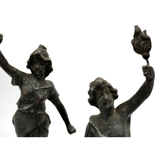 615 - Pair of French spelter figures, one labelled 'La Nuit' the other 'Le Jour', 35cm high (2)