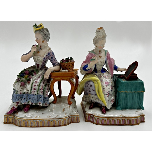 426 - Pair of 19th century Meissen porcelain figures of ladies sat at tables, with bocage work, 14cm high