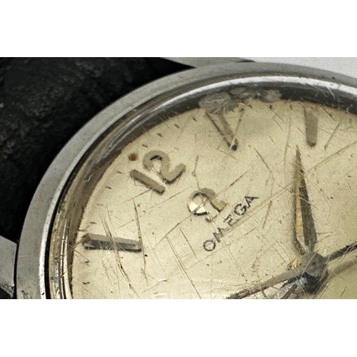 33 - 1950s Omega Seamaster stainless steel gents watch, 34mm case, cream dial with silvered hands and num... 