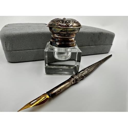 310 - 'Shakespeares Writing Set' - cased silver fountain pen and silver topped inkwell