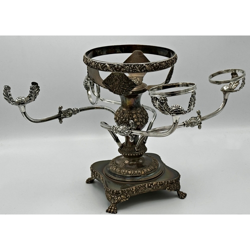 346 - Three late 19th century silver plated centrepieces comprising a four branch epergne, an eagle column... 