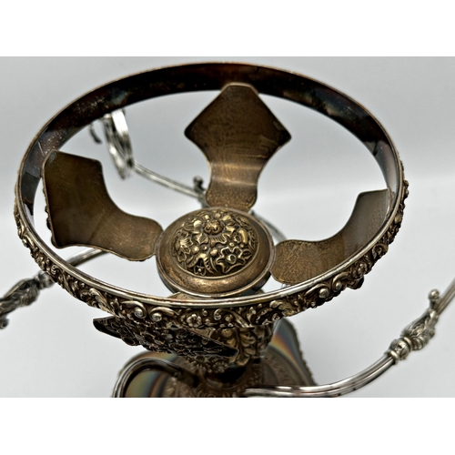 346 - Three late 19th century silver plated centrepieces comprising a four branch epergne, an eagle column... 