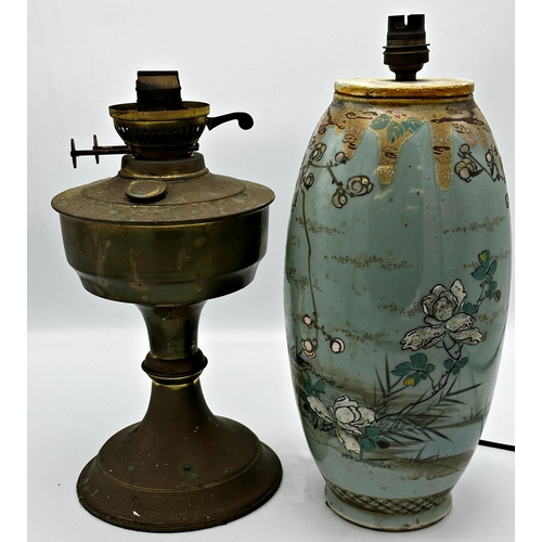 1178 - Late 19th century ceramic oil lamp, with faceted glass reservoir and cast brass base, total height i... 