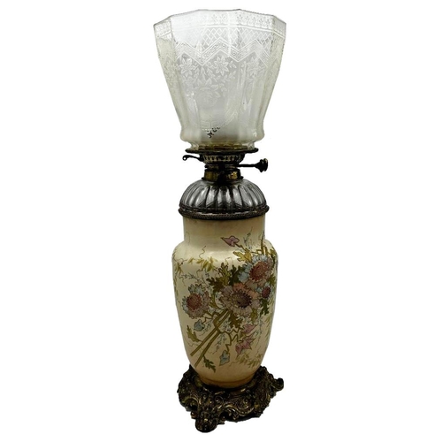 1178 - Late 19th century ceramic oil lamp, with faceted glass reservoir and cast brass base, total height i... 