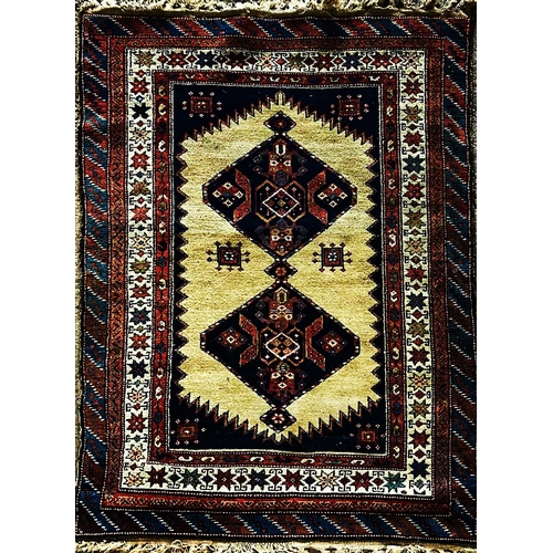 1599 - Full pile Afghan rug, twin blue medallions with cream and dark ground, L181 x W117cm