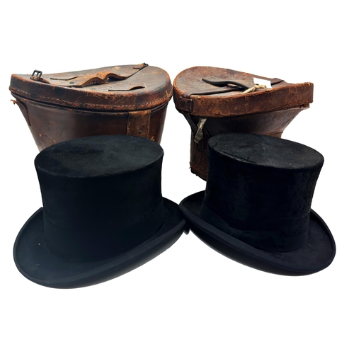 1584 - Two good quality silk top hats by Locke & Co Hatters of St James, London, with their original leathe... 