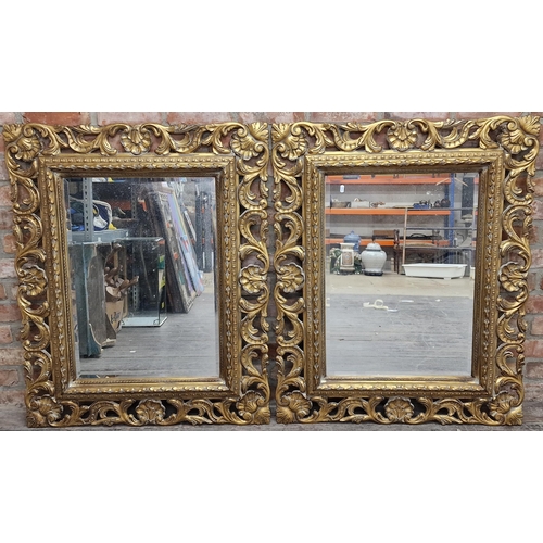 1136 - Pair of rococo gilt wall mirrors with bevelled plates, 110cm high