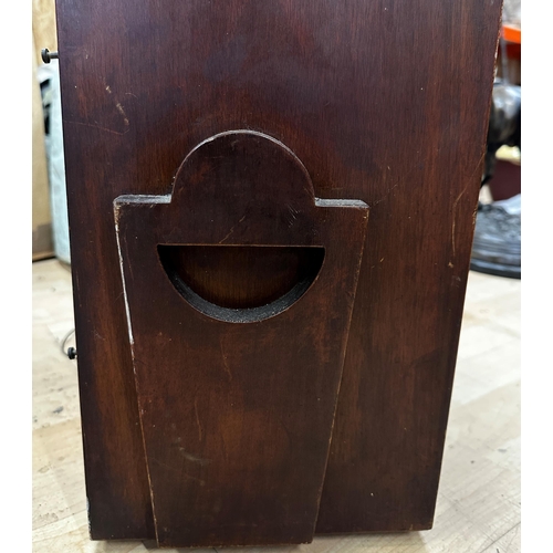 724 - Good novelty Art Deco mahogany radio, the front panel speaker pierced with a sunburst landscape, upo... 