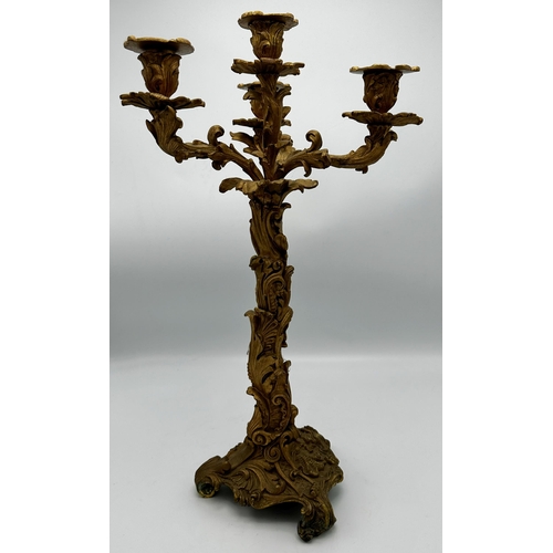 621 - Good quality gilt bronze  Rococo three branch candelabra, 50cm high