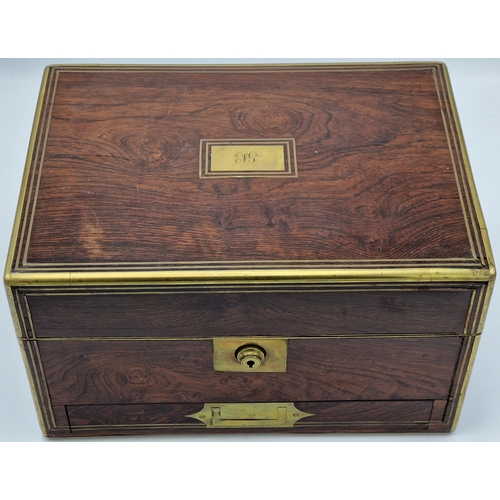 588 - Good quality late 19th/early 20th century Dunhill rosewood and brass bound humidor, the hinged lid e... 