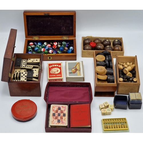 389 - Good collection of 19th century and later parlour games to include a collection of antique glass mar... 