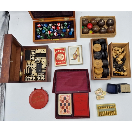 389 - Good collection of 19th century and later parlour games to include a collection of antique glass mar... 