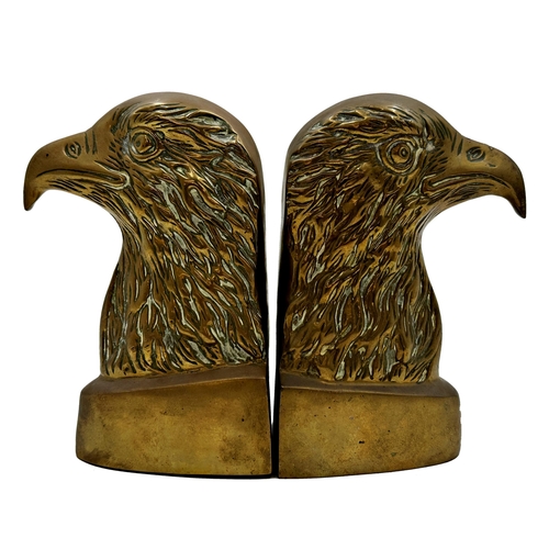 303 - Pair of 19th century cast brass eagle head bookends, each 20cm high x 14cm deep (2).