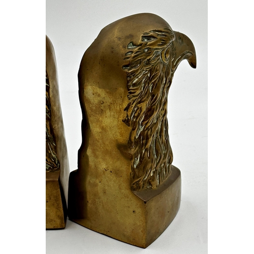 303 - Pair of 19th century cast brass eagle head bookends, each 20cm high x 14cm deep (2).