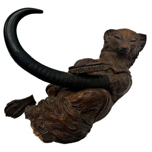 592 - Good Black forest bear wall hook, the bear polishing a horn hook, 24cm high (af)