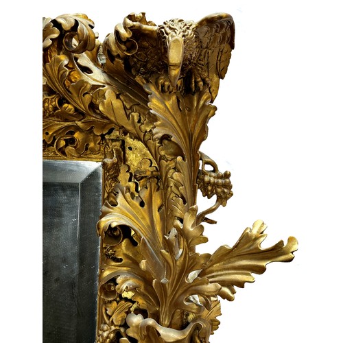 1146 - The most remarkable 19th century giltwood and gesso Florentine wall mirror, deeply carved with birds... 