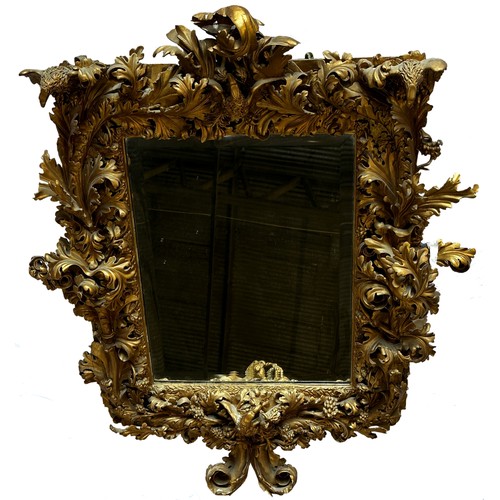 1146 - The most remarkable 19th century giltwood and gesso Florentine wall mirror, deeply carved with birds... 