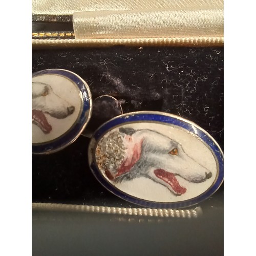 101 - Pair of white metal cufflinks enamelled with Afghan hound heads