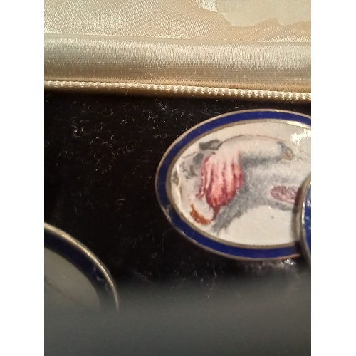 101 - Pair of white metal cufflinks enamelled with Afghan hound heads