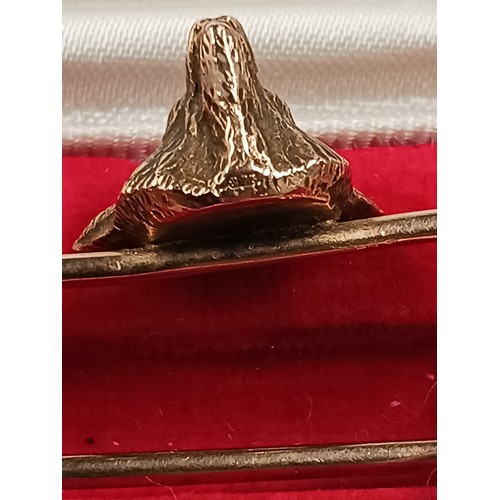 175 - 9ct fox head tie pin, ruby set eyes, 6.8cm long, 6.8g, in associated Asprey box