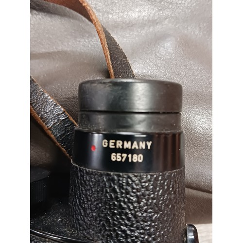 706 - Leitz Wetzlar of Germany 150m/1000m cased binoculars