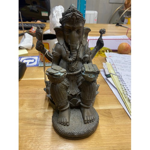 511 - Eastern bronze study of Ganesh seated on a lotus flower, 22cm high