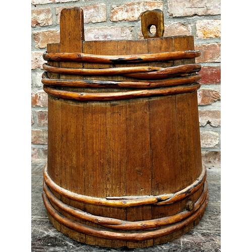 2323 - Primitive coopered grain barrel with bamboo strapwork, 60cm high x 58cm diameter