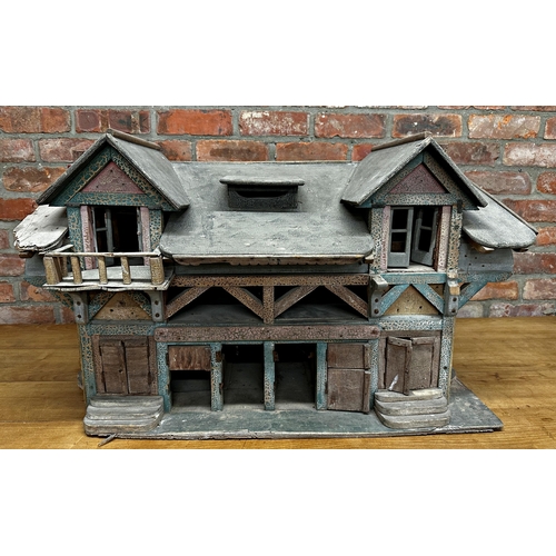 252 - Good large Folk Art dolls house of a stable building, with original paint and shutter doors and wind... 