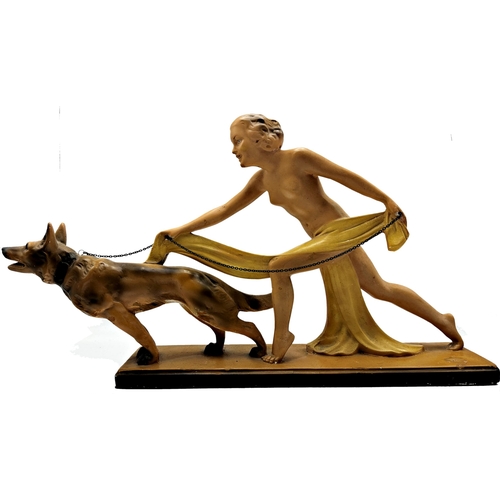 164 - Classic 1930s plaster figure of a nude female being pulled by an Alsatian dog on a lead, L 59cm