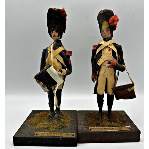 253 - Good late 19th century Folk Art diorama of hand crafted Napoleonic figures on a painted two tier sta... 