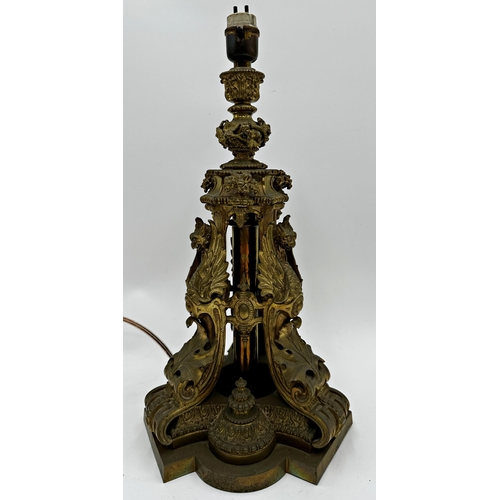 2184 - Good 19th century ormolu table lamp base, the trifom shape cast with griffins, foliage and Islamic f... 